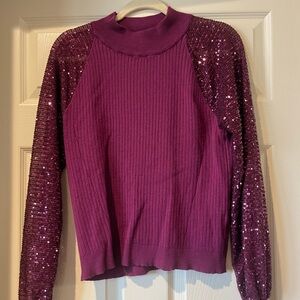 The limited sequin sweater
